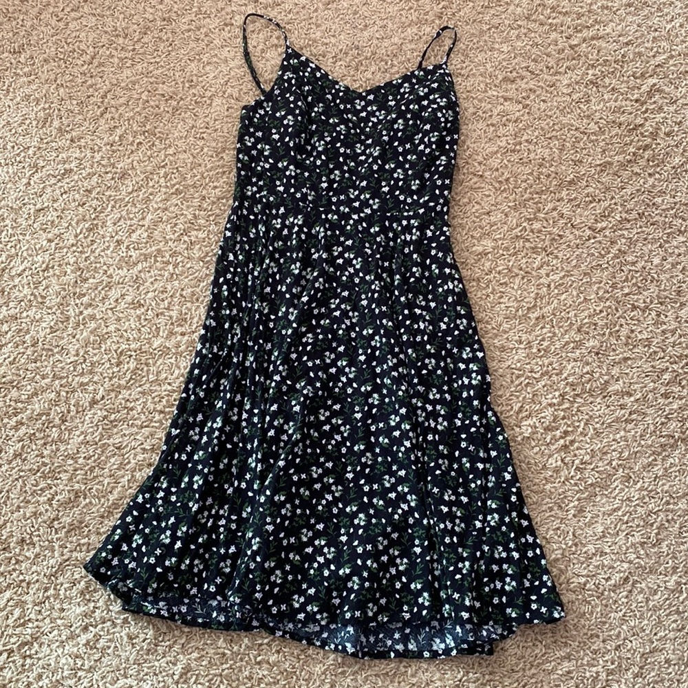 Super cute dress just too small for me.